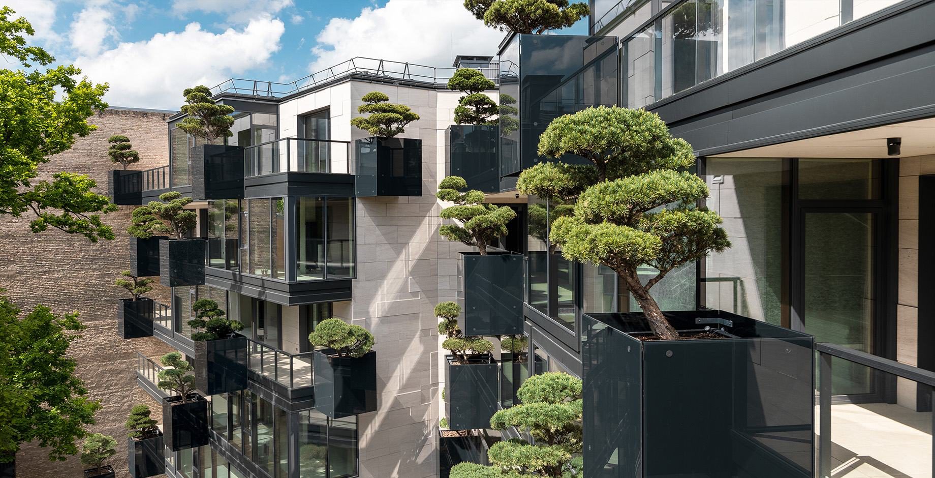 HOFT residential complex with bonsai trees on every balcony